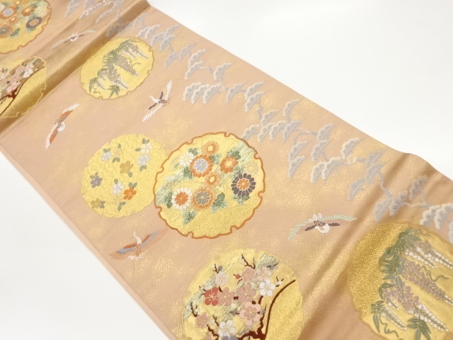 雪輪に花々・鶴模様織出し袋帯